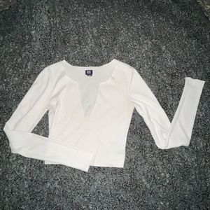Cream ribbed BDG long sleeve shirt with deep v neckline. Fitted size S